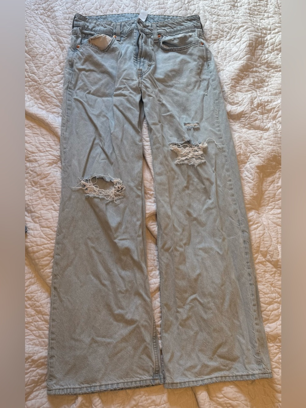 Wide leg ripped denim jeans